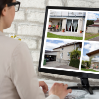 Woman looking at homes on a computer