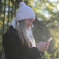 Appleton, Wisconsin woman checking her credit score on cell phone