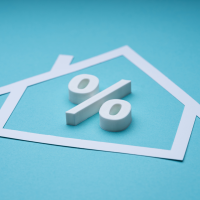 House with Percentage Sign in the Middle Signaling a High Ratio Mortgage - Toronto Real Estate